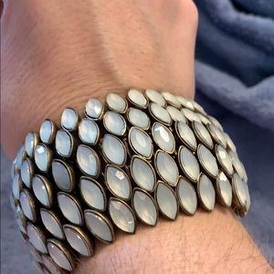 Gold and pale gems bracelet